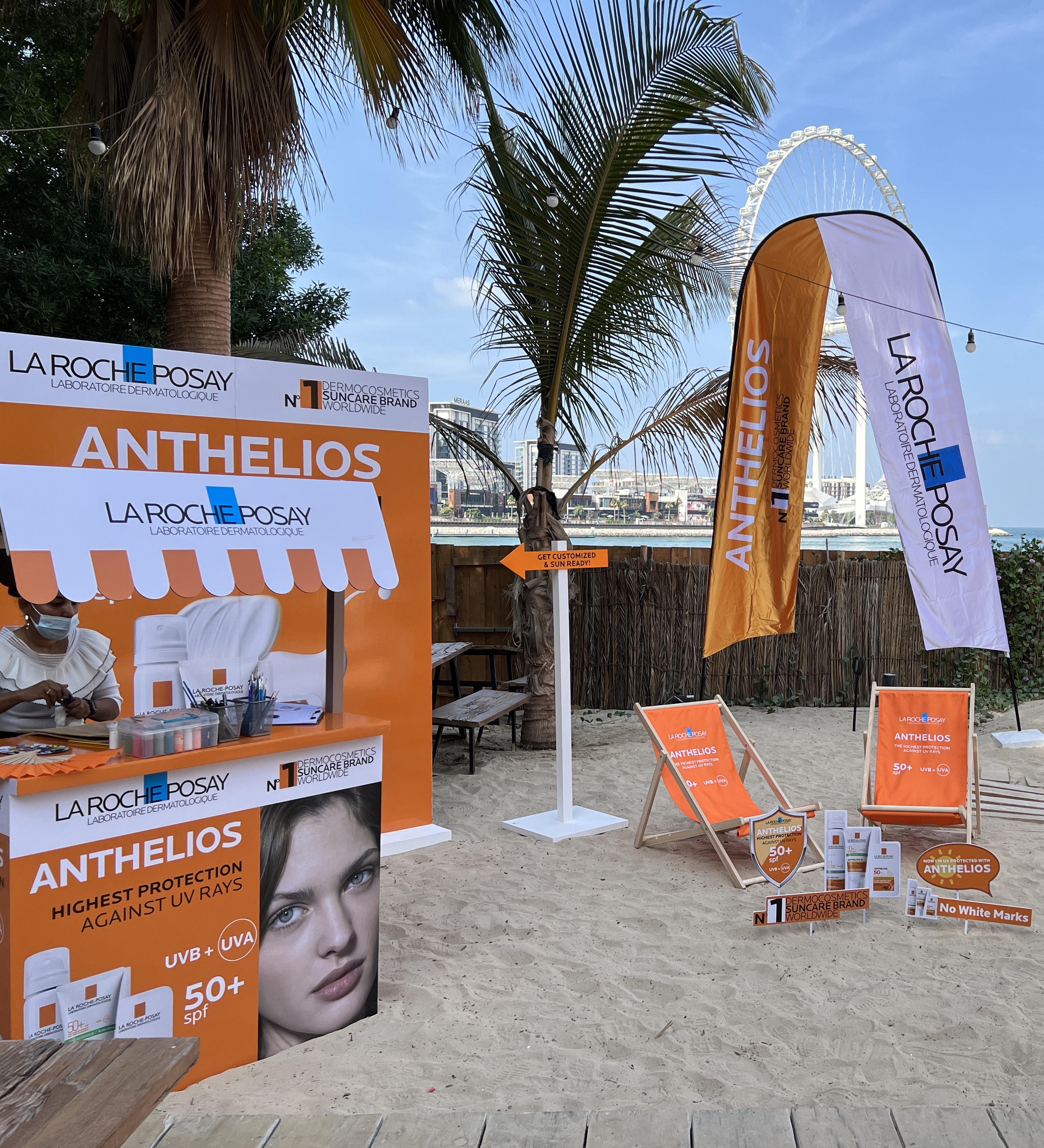 Orange La Roche-Posay Anthelios beach activation with product displays